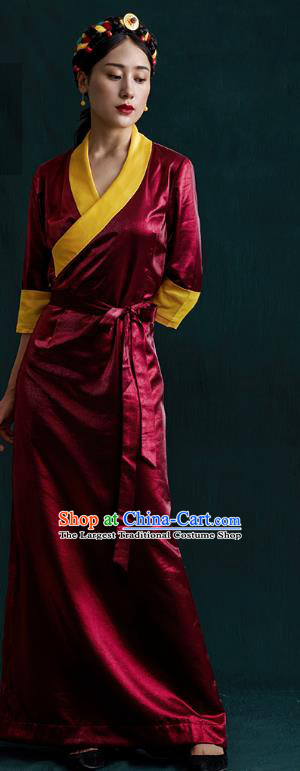 China Traditional Tibetan Ethnic Woman Clothing Zang Nationality Kangba Wine Red Bola Dress