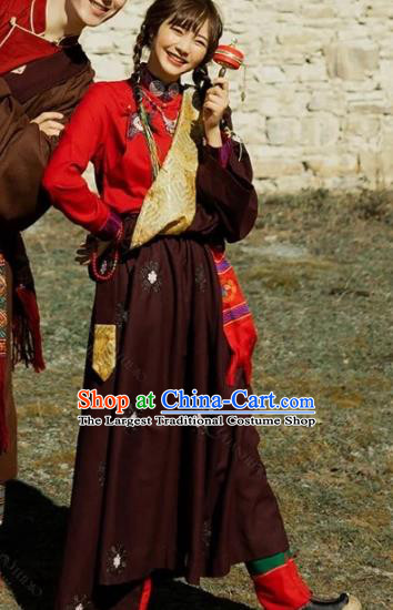 China Traditional Xizang Minority Young Lady Wine Red Tibetan Robe Zang Nationality Folk Dance Clothing