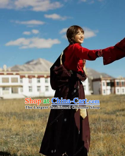 China Traditional Xizang Minority Young Lady Wine Red Tibetan Robe Zang Nationality Folk Dance Clothing