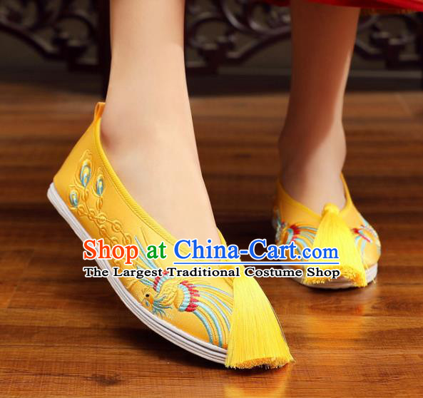 China Embroidered Phoenix Shoes Handmade Bride Shoes XiuHe Yellow Satin Shoes Classical Wedding Tassel Shoes