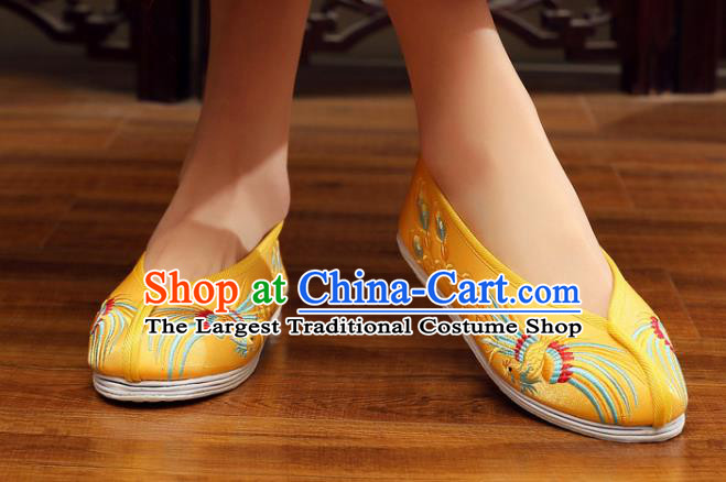 China Embroidered Phoenix Shoes Handmade Bride Shoes XiuHe Yellow Satin Shoes Classical Wedding Tassel Shoes