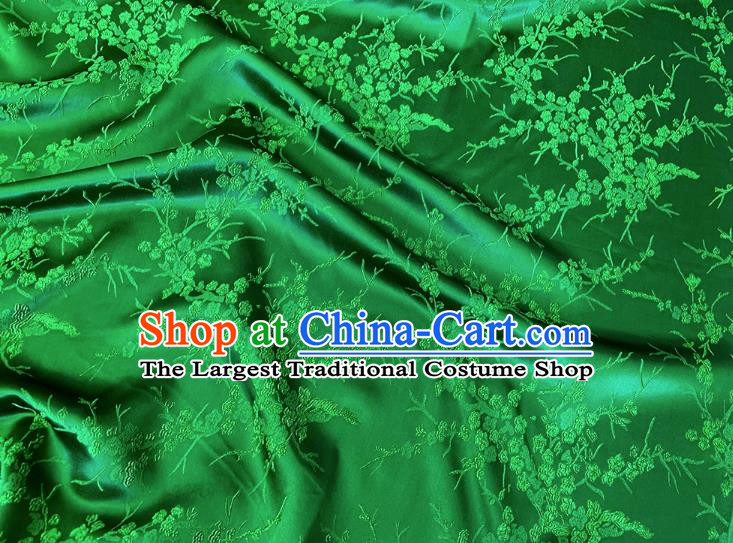 Green China Classical Embossed Plum Blossom Pattern Silk Cheongsam Stretch Fabric Traditional Material